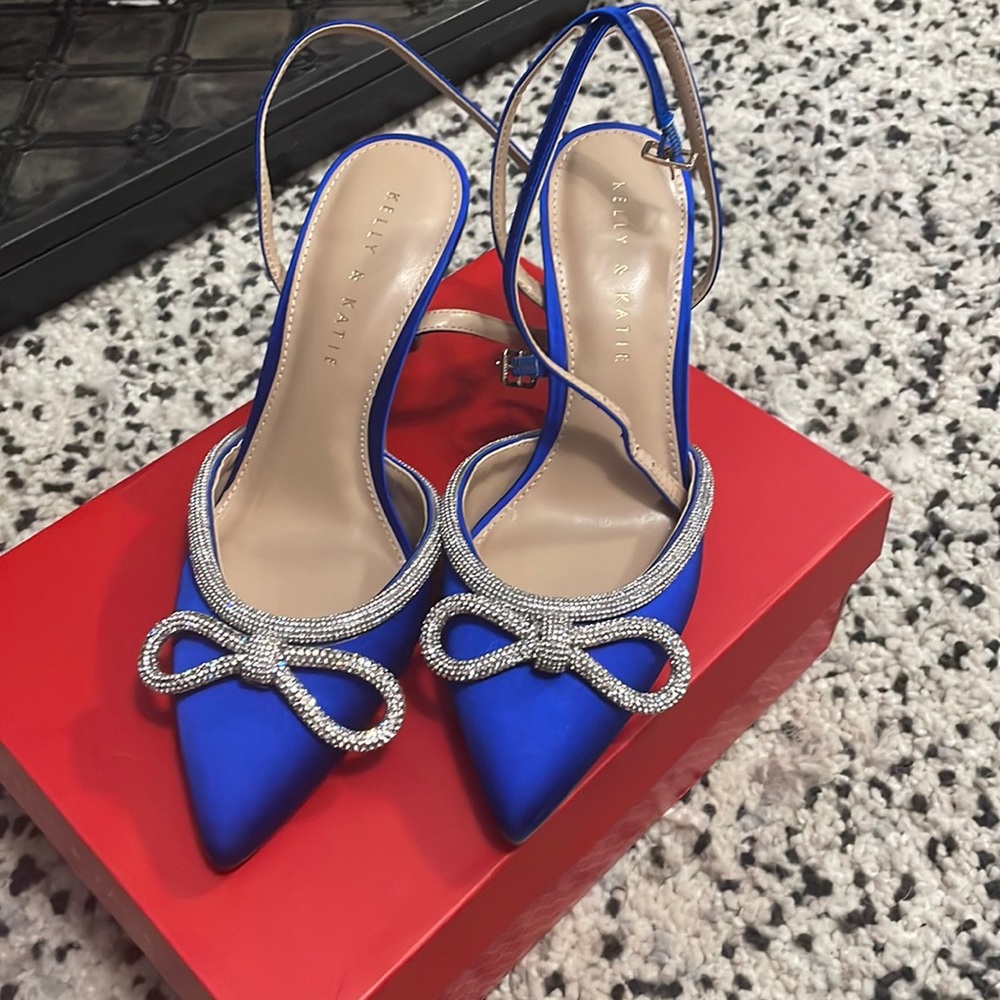 Brand new blue pumps with bling bow